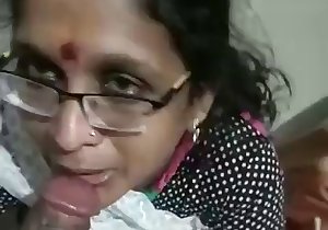 Indian lady worships this dude's hard dick here