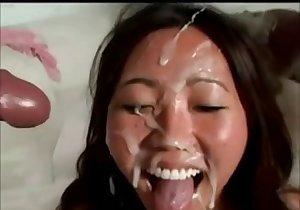 Asian hottie takes a facial in a hardcore video