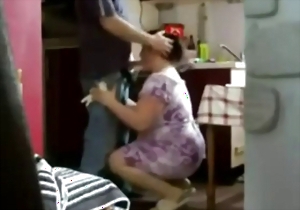 Hot chubby mature sucks his hard penis down on the knees